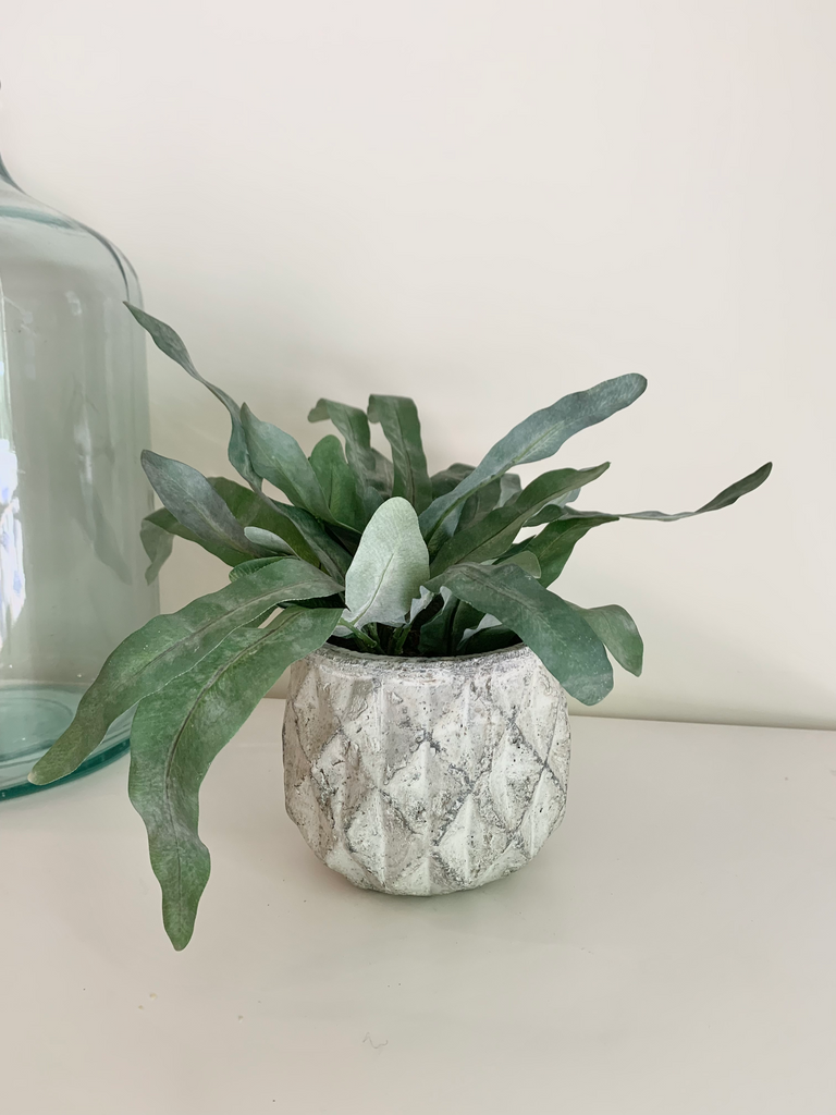 Concrete vase with faux plant